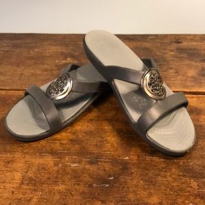Black Croc Slides with medallion embellishment